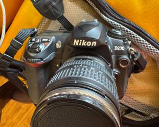 93- 	$300.00	Camera bag includes Nikon D200 camera + lens Sigma DGMacro 50mm + Tokina SD 12-24 F4 (IF) DX + 10X-300X lens + tripod + flashes 