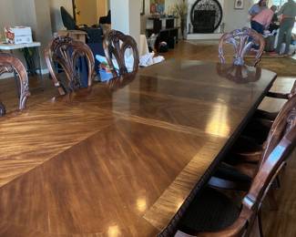 32	800.00	Dining room table mahogany veneer total length 9'3" or smaller 6'2" (each leaves is 18"W x 2) table is 45"Dx 30"H & 8 arm chairs 