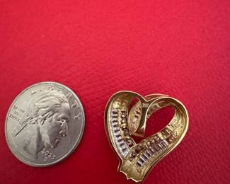 $400 - 14kt yellow gold & diamond heart 4.78gr. 