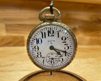 7 DUP	95.00	Elgin pocket watch grade 573 - 17 jewel with Montgomery railroad dial - crystal damaged 