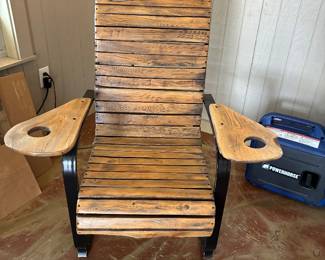 88	220.00	Wood chair on metal frame with drink holders. 