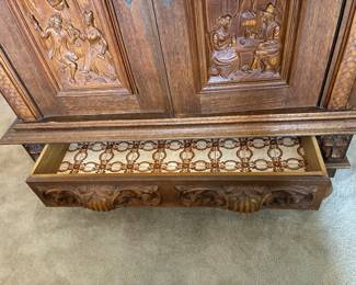 74	500.00	Antique Oak Belgian linen cabinet 51Wx19Dx58H - carved figurines - with long bottom drawer