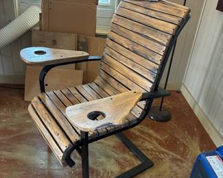 88	220.00	Wood chair on metal frame with drink holders. 