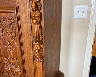 74	500.00	Antique Oak Belgian linen cabinet 51Wx19Dx58H - carved figurines - with long bottom drawer