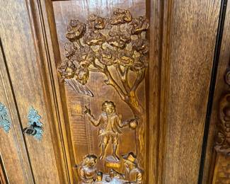 74	500.00	Antique Oak Belgian linen cabinet 51Wx19Dx58H - carved figurines - with long bottom drawer