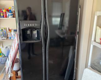 #60 - $300 - Black refrigerator Frigidaire with ice maker Model #FLSC238DB2 - 2006