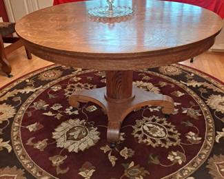 #1 Round oak pedestal table 48"D x31T with 6 chairs with leave $650