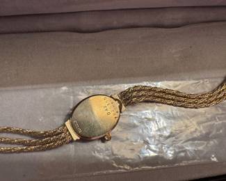 #77 - $875 - Movado ladies watch 14.42gr 14kt gold D42- 7