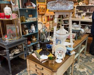 side tables, framed oils and watercolors, lamps