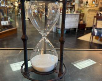 Decorative Hourglass with a dark metal frame