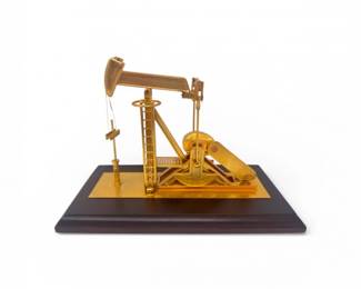 105 EnescoOilPumpjackModelGoldToneOnWoodBase
