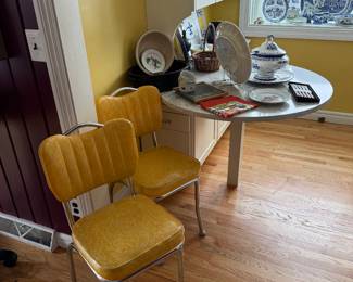 Kitchen 
Vintage vinyl/chrome chairs