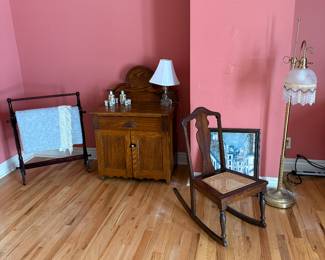 Primary Bedroom 
Commode
Quilt rack
Rocking chair
Floor lamp 