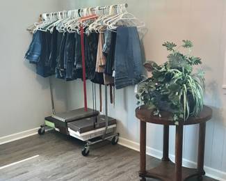 LOTS OF JEANS.   BOOTS AND NICE SIDE TABLE