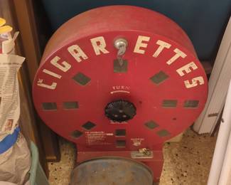 vintage "Dial A Smoke" cigarette vending machine from the 1940s