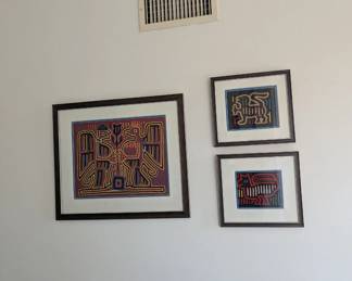 Mola art, which are traditional hand-stitched textiles created by the Guna women of Panama using a reverse appliqué technique