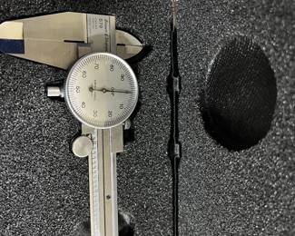 Precision stainless steel dial caliper, in original case...awesome!