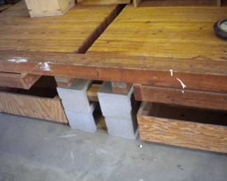 Heavy duty 2x4 work table with roll out storage disassembles/ blocks included