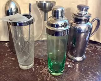 Five Cocktail Shakers And Wine Decanter