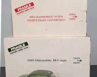 DANBURY MINT Two Oldsmobiles