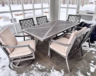 Outdoor dining table with 2 swivel chairs, 4 side chairs, plus cushions