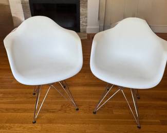 Herman Miller Eames style fiberglass chairs with pyramid bases