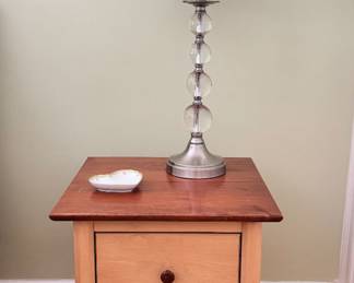 Maple/cherry Nadeau 2-drawer nightstand and a glass lamp