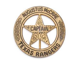 Augustus McCrae Texas Rangers Captain's badge made by the Lopez Brothers, the official Texas Rangers badge makers, from a Mexican cinco peso coin, plated in 22K gold (customary for Captains' badges), marked