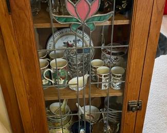 Vintage oak display cabinet with floral design