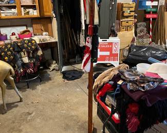 Garage is full of clothes and collectibles