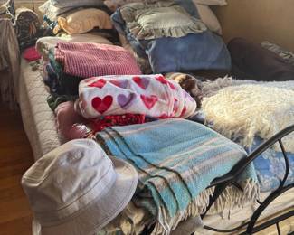 Blankets and Pillows.  Bed and Bed frame not for sale.