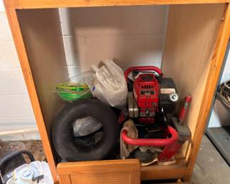 Gas-powered generator, spare tires, garage storage