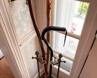Vintage walking canes and cane stand collection