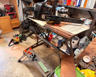 Workbench with chainsaw, bar clamps, power tools