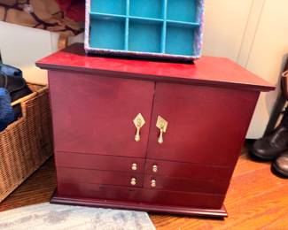 Large wooden jewelry chest with brass hardware, velvet lined