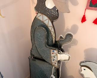 Folk art wooden holiday yard decorations, snowman and penguin