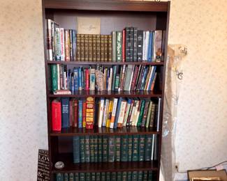 Wooden bookcase with encyclopedia set and book collection