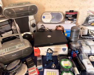 Sony portable radio, CD players, cameras, flashlights, electronics
