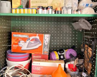 Garage hardware supplies, sandpaper, tape, extension cords, surge protector