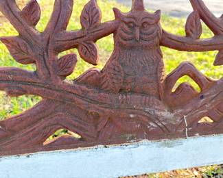Cast iron garden bench detail, ornate vine pattern