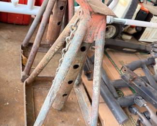 Metal sawhorses, aluminum ladder, garage equipment