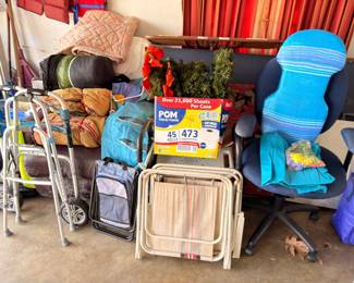 Folding chairs, pillows, luggage, holiday decor, garage storage