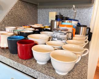 Assorted coffee mugs and cups collection