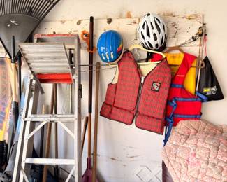 Aluminum ladder, bicycle helmets, life vests, garage items