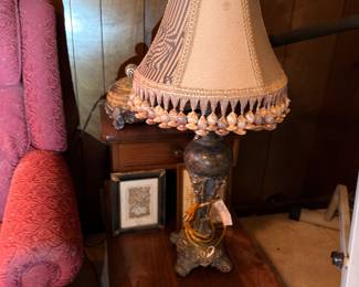 Vintage ornate table lamp with fringed Victorian shade