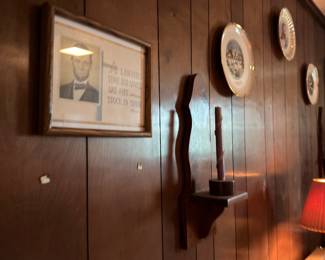 Framed artwork and decorative plates wall gallery
