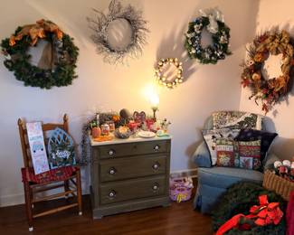 Seasonal wreaths, holiday decorations, green painted dresser