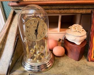 Vintage glass dome anniversary clock, brass pendulum