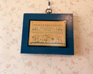 Antique cross-stitch alphabet sampler, framed