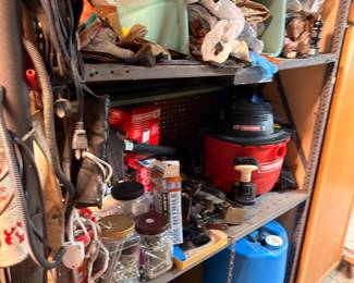 Garage shelving, tools, water jug, household items